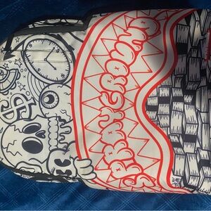 Sprayground Black and Red Graphic Skull Backpack